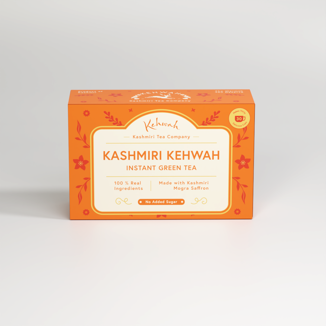 An orange Kashmiri Kehwah Instant Green Tea box, labelled No Added Sugar.