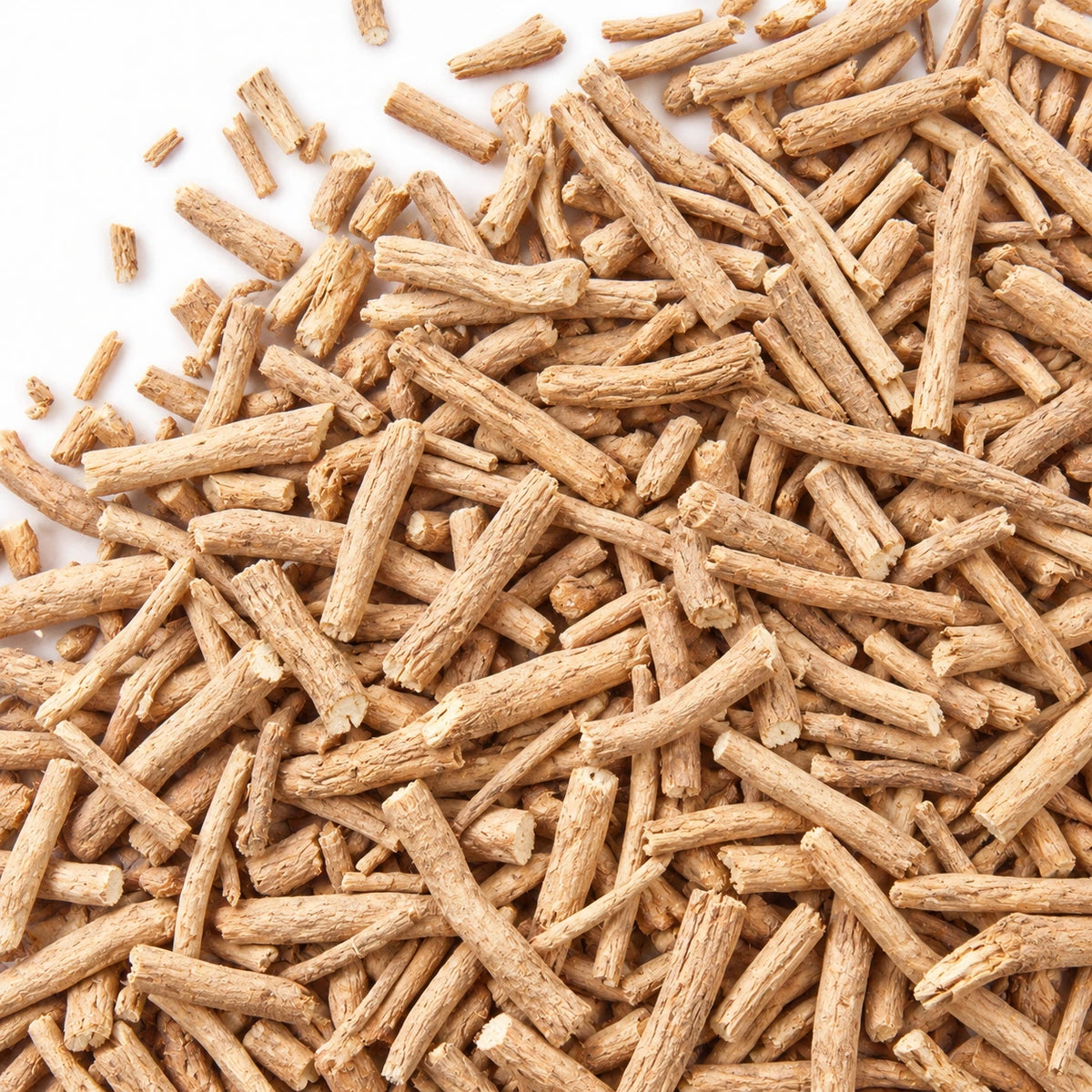 Dried ashwagandha roots on a white background