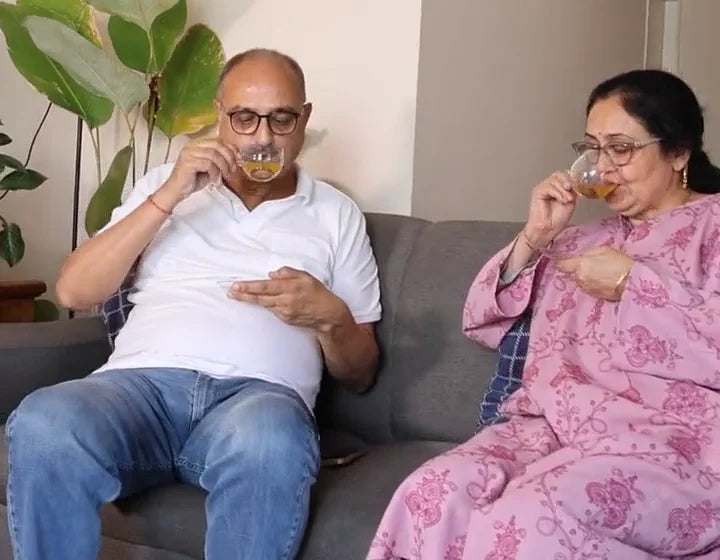 Ma and Pa sharing a cup of Kehwah at home.